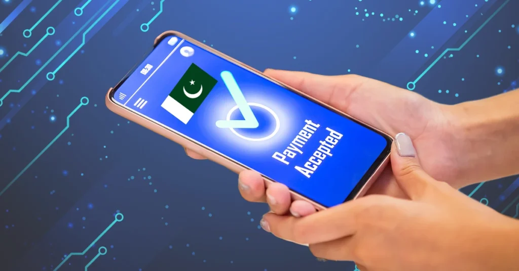 A person holding a smartphone displaying a digital pakistan payment confirmation screen with a "Payment Accepted" message and a Pakistani flag, set against a futuristic tech-themed background.